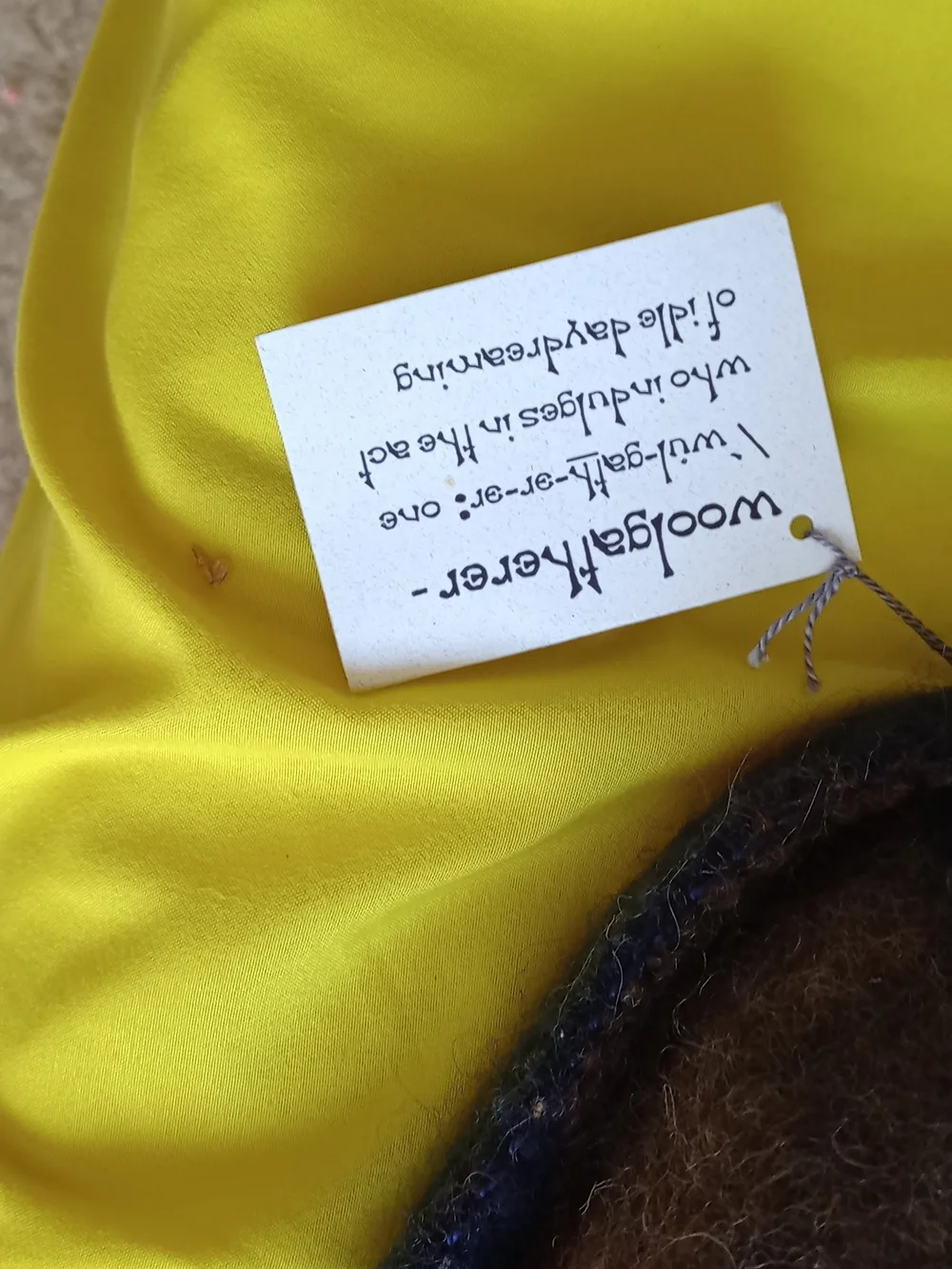 Sgailean handmade blue and rust-colored felted wool cloche hat.